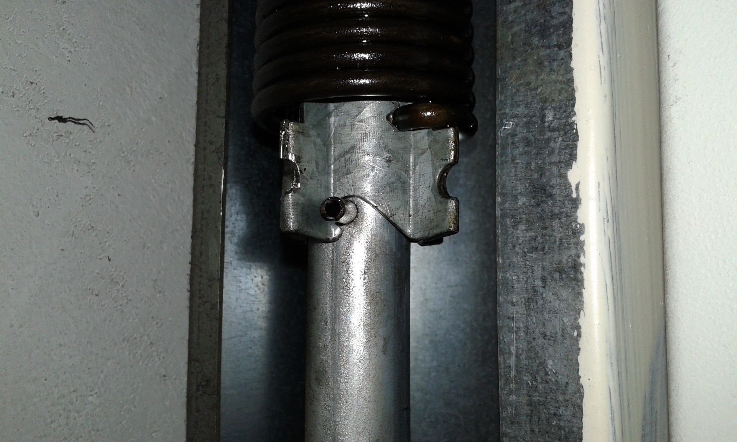 Tensar muelle puerta garaje roper - Reparaciones - Todoexpertos.com